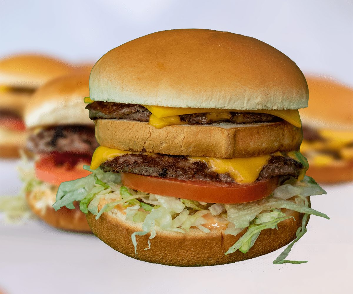 The Big Bronco: two smashed patties, melted cheese, a middle bun, lettuce, tomato and Bronco's sauce